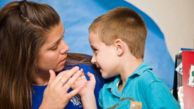 Human services in child protection woman working with boy